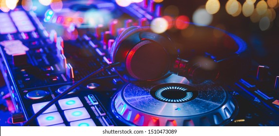 Club Concert Party Musical EDM Sound on Stage Show DJ . Bokeh Blur Background.