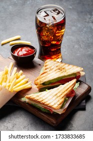 Club Sandwich, Potato Fries Chips And Glass Of Cola Drink With Ice. Fast Food Take Away