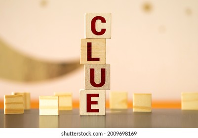 Clue Word From Wooden Blocks On Desk.