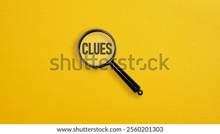 Clues are shown using the text under magnifying glass