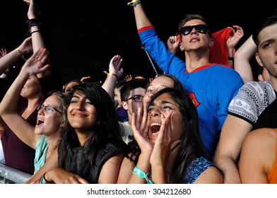 CLUJ NAPOCA, ROMANIA - JULY 30, 2015: Crowd Of Cheerful Young People Having Fun
 During A Live Concert At Untold Festival In The European Youth Capital City Of Cluj Napoca