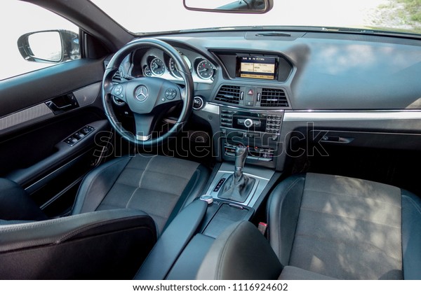 Cluj Napoca/Romania-June 20, 2018: Mercedes Benz\
W207-year 2010, E Class coupe,Avantgarde equipment;luxury leather\
interior, heated seats buttons, black upholstery, cruise control,\
dashboard, sport