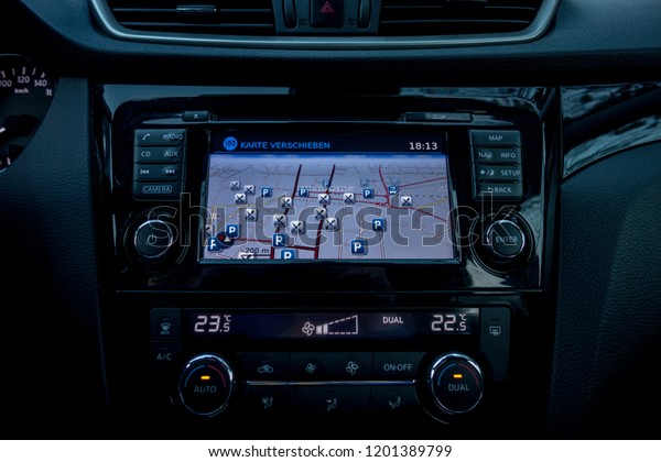 Cluj
Napoca/Romania-November 07, 2018: Nissan Qashqai Acenta-year 2015,
SUV car photo session on grass decor in autumn. Panoramic interior
close up photo, dashboard instrument cluster
details