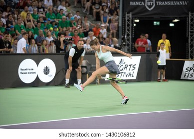 CLUJ, ROMANIA - JUNE 15, 2019: Tennis Player Legend Simona Halep Playing Against Daniela Hantuchova During The Sports Festival