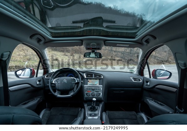 Cluj-Napoca, Cluj-Romania-02.02.2022-Inside view\
Citroen C4 panoramic sunroof, with leather upholstery, navigation\
unit, climate control,massage seats, heated seats, and\
multifunctional steering\
wheel
