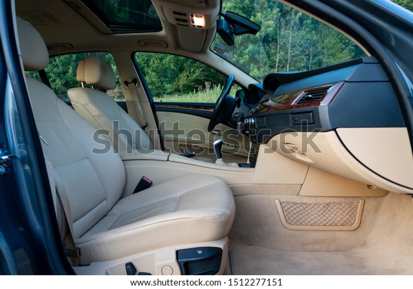 Cluj-Napoca, Cluj/Romania-09.14.2019-Leather\
upholstery is created in a luxurious and well-maintained BMW 5\
Series from 2008