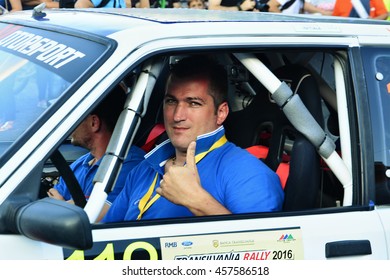 CLUJ-NAPOCA, ROMANIA - JULY 21, 2016: Race Car Driver Romain Desire Marc Gilles Shows Thumb-up Before The Start Of Transilvania Rally.