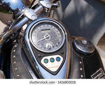 Cluj-Napoca, Romania - June 17, 2019: Kawasaki Vulcan 900 Classic motorbike with tank mounted dashboard, analogue speedometer and warning lights, closeup