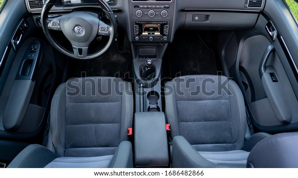 Cluj-Napoca,Cluj/Romania-07.01.2019-Alcantara
upholstery inside a minivan VW Touran, facelift, year 2012 blue
motion technology. Sunroof
view