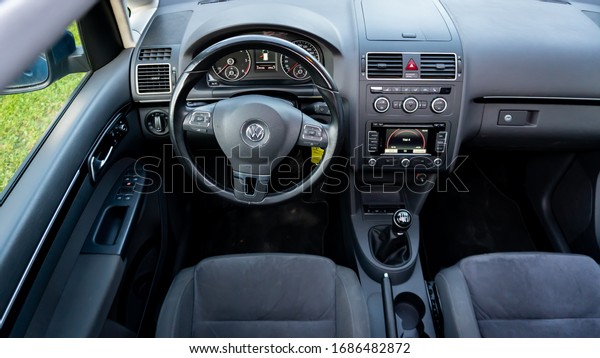 Cluj-Napoca,Cluj/Romania-07.01.2019-Alcantara\
upholstery inside a minivan VW Touran, facelift, year 2012 blue\
motion technology. Sunroof\
view