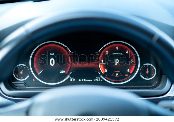 Cluj-Napoca,Cluj-Romania-07.09.2021-Electronic\
instrument cluster inside BMW 5 series, year 2015.  Innovation and\
design is evident in this instruments, digital displays and\
interfaces.
