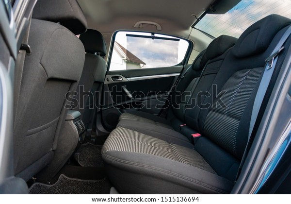 Cluj-Napoca,Cluj/Romania-09.04.2019-Interior\
detailed photo of an Peugeot 407 sedan textile upholstery interior\
and\
dashboard
