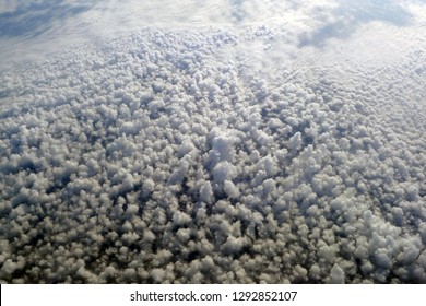 Clumps of cloud seen from the plane's window while on the island of Sumatra.