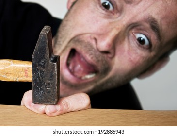 Clumsy Man With Hammer