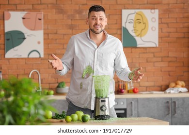 Clumsy Man With Spilled Smoothie In Kitchen