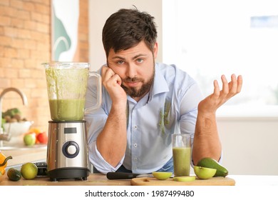 Clumsy Man With Spilled Smoothie In Kitchen