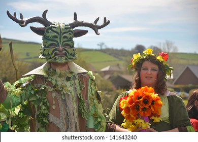 CLUN, UK MAY 6: The Green Man And May Queen In Clun, Shropshire, May 6 2013. The Green Man Festival Is An Annual Traditional May Day Bank Holiday Celebration.