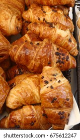 A Cluster Of Freshly Baked French Croissants With Chocolate Flakes For Bastille Day Celebrations During NYC Street Fair

