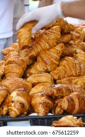 A Cluster Of Freshly Baked French Croissants With Chocolate Flakes For Bastille Day Celebrations During NYC Street Fair