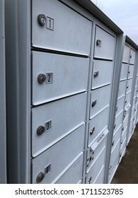 Cluster Mail Boxes Grey Near Road Lots Of Cluster Mail Boxes With Compartments Grey Lined Up Mail Boxes Dirty