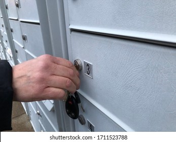 Cluster Mail Boxes Grey Near Road Lots Of  Mail Boxes With Compartments Grey Lined Up Woman Opening Up Mail Box