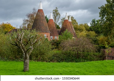 Cluster of Oast houses in the high weald countryside near Lamberhurst Kent south east England - Shutterstock ID 1550340644