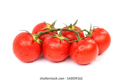 Cluster Of Tomatoes Are Located On The White Background