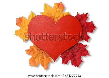 a cluster of vibrant fabric maple leaves in shades of yellow orange and red layered with visible black veins, creating a rich autumn feel on white background with soft shadow with red heart shape 
