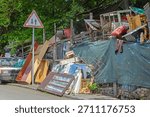 Clutter of Old Things Junk Trash Waste Garbage Hoarder House Problem