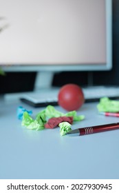 Cluttered Work Desk In The Office