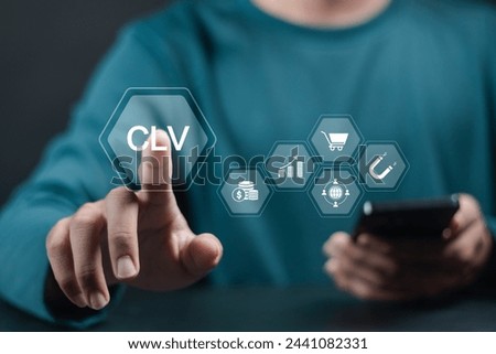 CLV, Customer lifetime value concept. Increasing CLV marketing strategy planning, Businessman touching CLV icon on virtual screen.