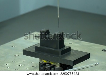 The  CMM machine measuring the graphite electrode parts . The quality control of mold and die manufacturing process with multi axis CMM machine.
