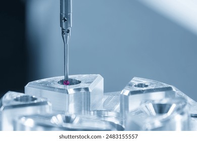 The  CMM probe measuring the  aluminum automotive parts. The quality control of automotive parts with  Coordinate Measuring Machine. - Powered by Shutterstock