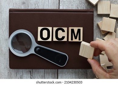 CMO - short for Chief Marketing Officer. word concept written on wooden blocks.