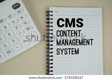 CMS Abbreviations of ontent Management System text with calculator phrase of business and financial concept