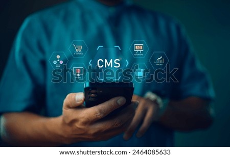 CMS concept, content management system. Businessman using smartphone to management CMS software for publishing content. Blog promotion, data administration and website optimization concept.