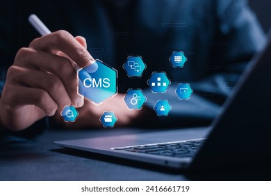 CMS, Content management system concept, Businessman use laptop with virtual screen of content management system icon for business website management.