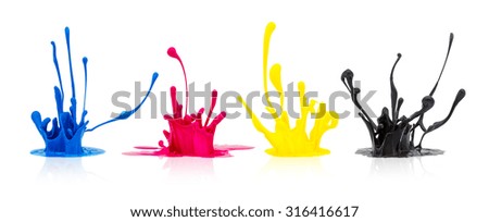 CMYK paint splashing on white background