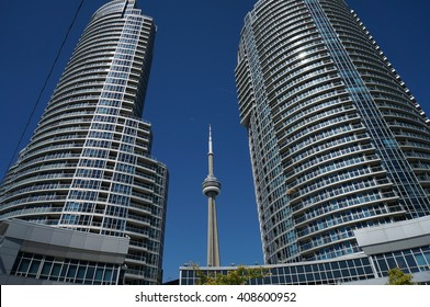 CN Tower Between Two Buildings From The Harbour Front Toronto 