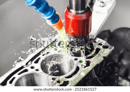 CNC Automatic Cylinder Honing Machine of engine. Car workshop, machine with a Computer numerical control.