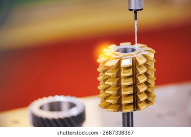 Cnc coordinate measuring machine inspecting gear precision, macro photo.