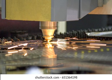CNC Laser Cut Machine While Cutting The Sheet MetalCNC Laser Cut Machine While Cutting The Sheet Metal