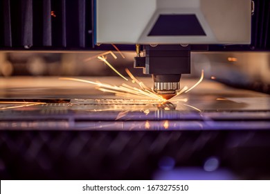CNC Laser cutting of metal modern industrial technology. Laser cutting works by directing the output of a high-power laser through optics. Laser optics and CNC computer numerical control.