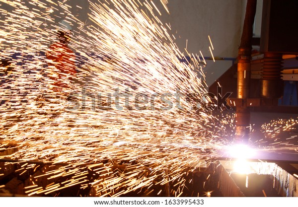 CNC Laser cutting of metal, modern industrial\
technology. 