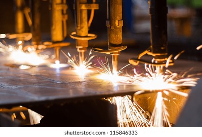 CNC LPG cutting with sparks close up - Powered by Shutterstock