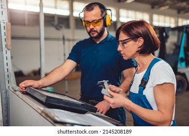 CNC Machine Operator Checking Finished Product