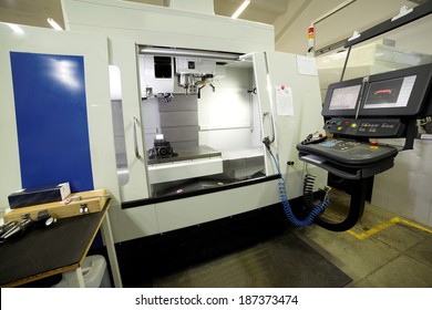 CNC Machine Shop With Lathes, Technicians And Workers