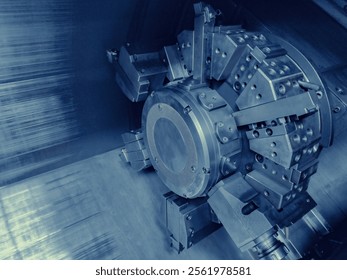 CNC Machine Tool in Operation. Close-up view of a high-tech CNC machine tool turret. Ideal for illustrating advanced technology in industrial and engineering contexts.