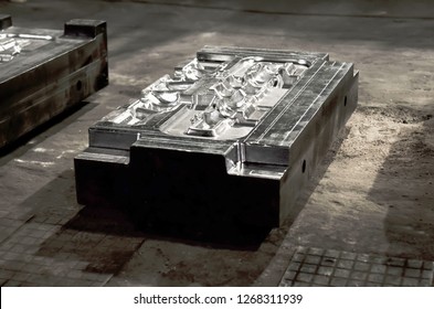 
CNC Machinery In The Industrial Factory. Detail - Form Part Of A Cast Machine.  Sheet Metal Stamping Tool Die For Automotive Precision Parts.  Huge Forging Presses.