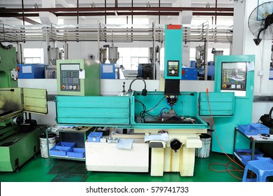 CNC machines during the process at empty workshop